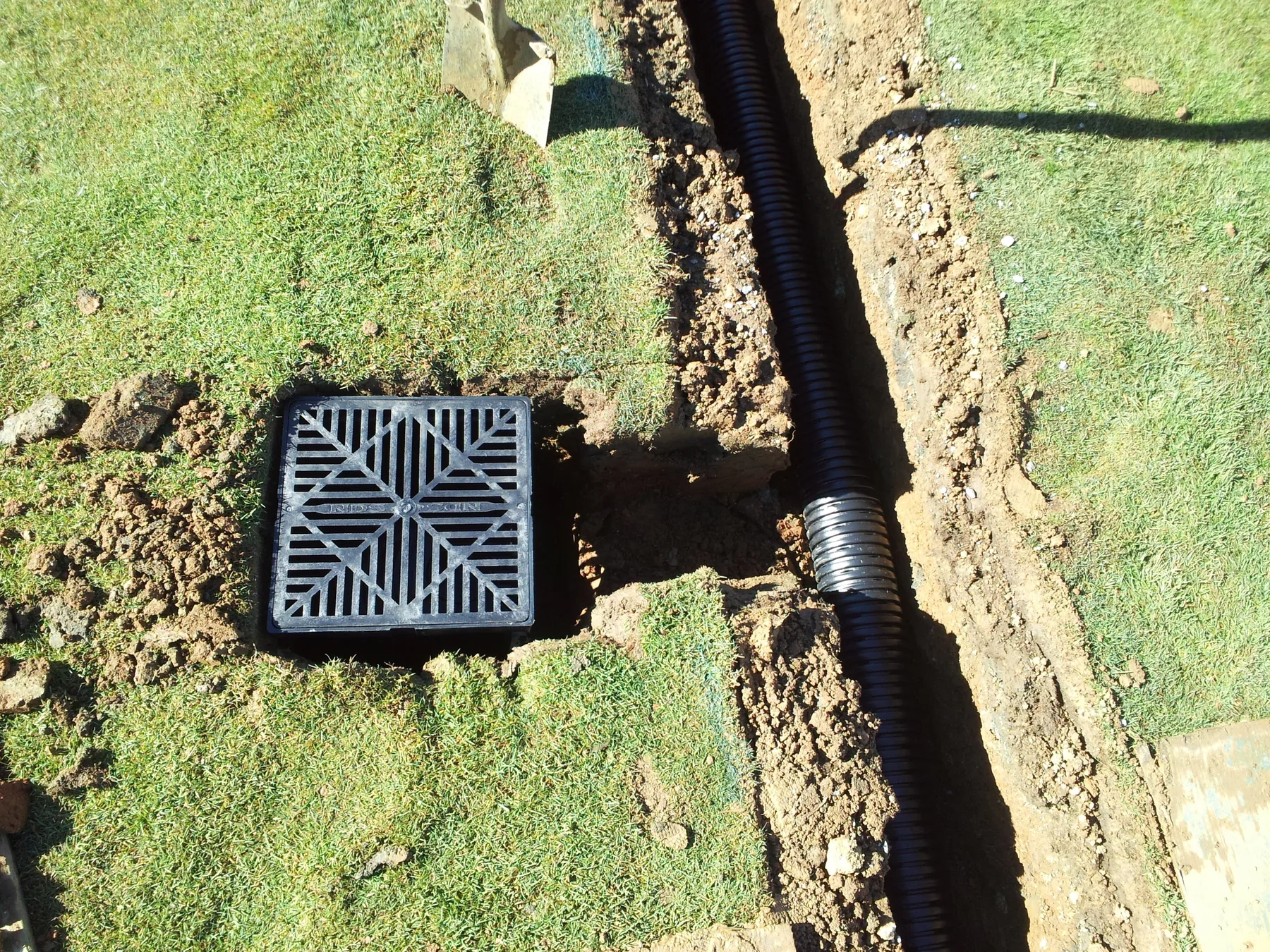 Pipe connected to catch basin