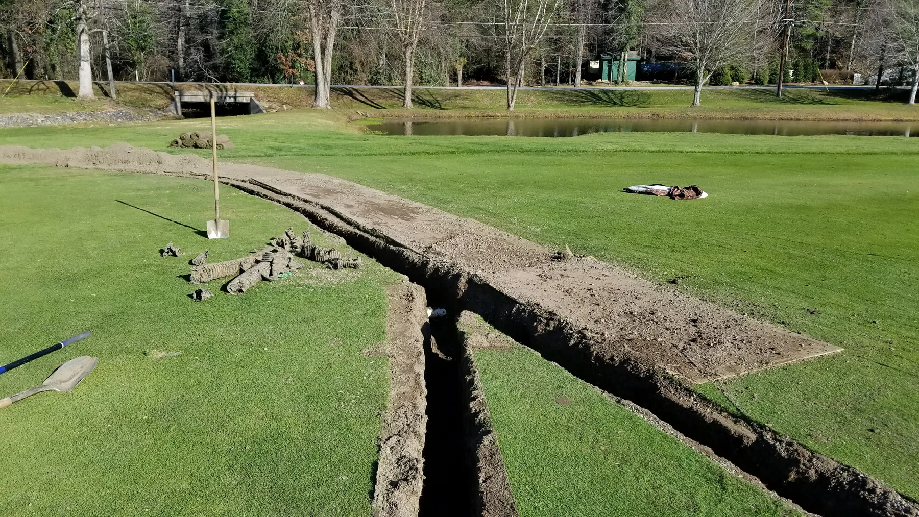 Precisely cut sod at a greenside trench