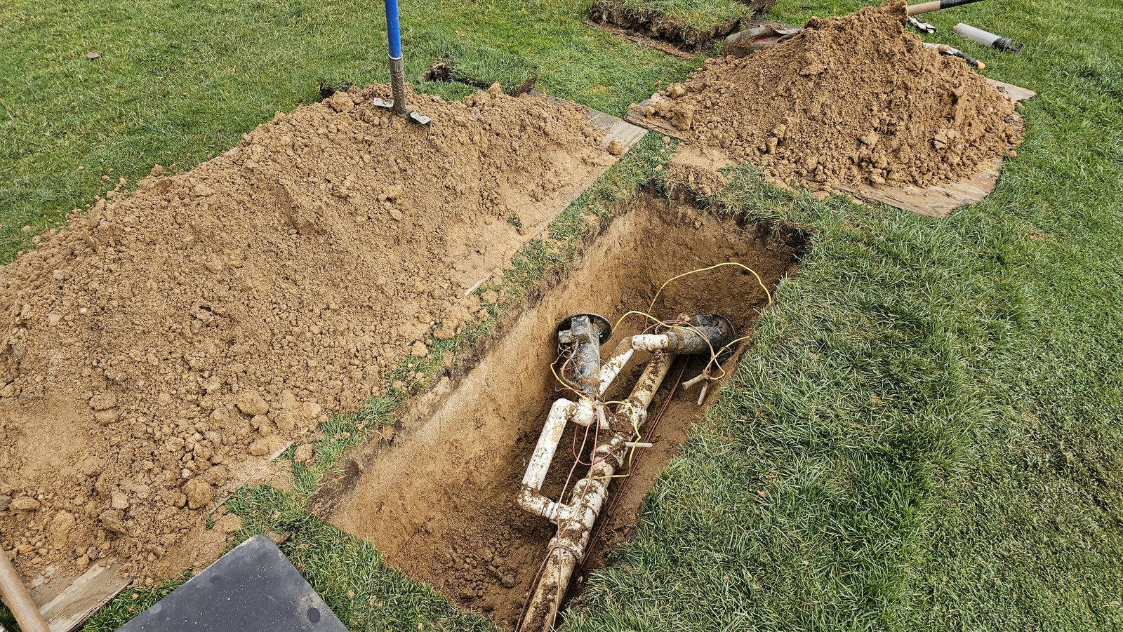 Irrigation valve repair in a turf area