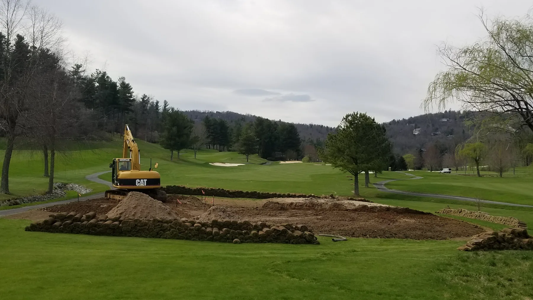 Excavator reshaping tee