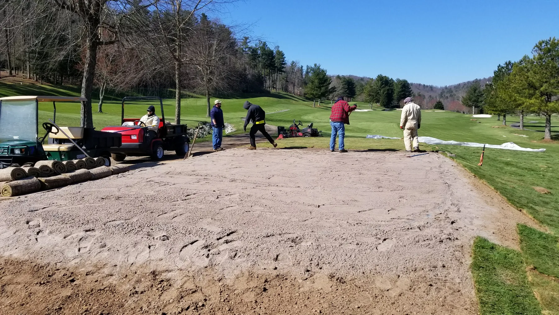 Raking root-zone surface